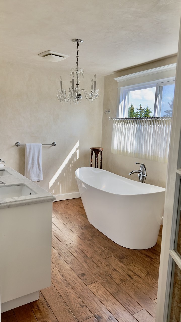 Detailed bathroom cleaning of tile, glass, and fixtures